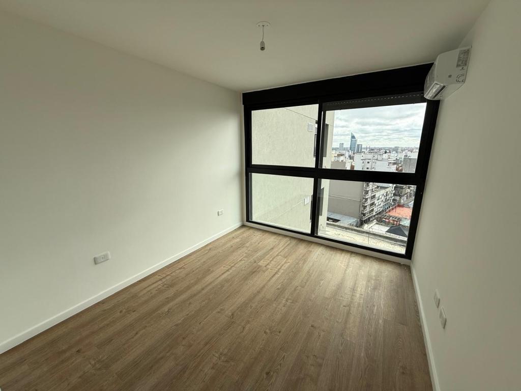 Alquiler apartamento 1 domitorio en centro, piso alto y vista despejada.