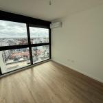 Alquiler apartamento 1 domitorio en centro, piso alto y vista despejada.