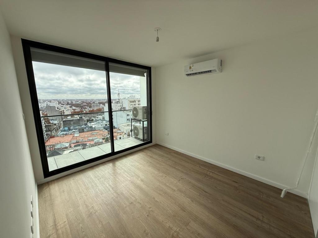 Alquiler apartamento 1 domitorio en centro, piso alto y vista despejada.