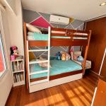 Venta de apartamento tipo casa de 3 dormitorios, 3 baños, parrillero y garage en Parque Batlle.