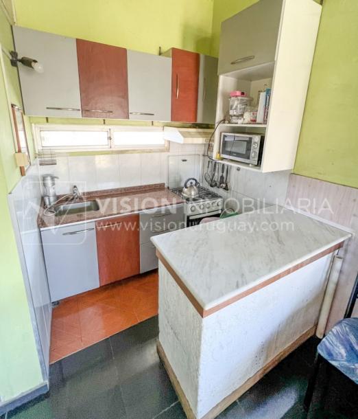 Venta conjunta de Dos Casas independientes en un gran terreno de 622 m2, una de 2 Dormitorios y 1 Baño, la otra de 1 Dormitorio y 1 Baño, Parrillero, Garaje. Barrio Español del balneario Atlántida, 8 cuadras al Norte de la Interbalnearia por Ruta 11.-34