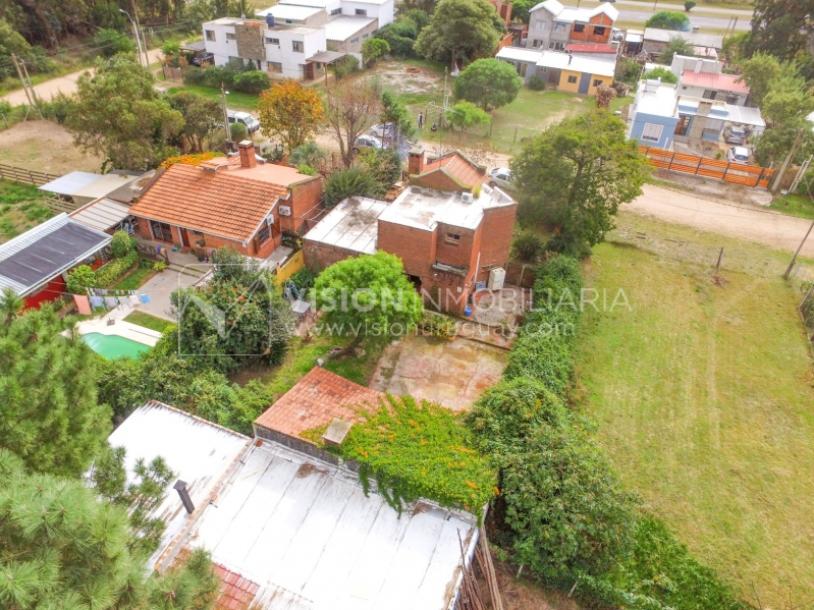 Casa moderna 2 dorm, 2 baños, 409 m2 terreno y 157m2 construidos, Fortin de Santa Rosa, con buen fondo y barbacoa, Garaje.-45