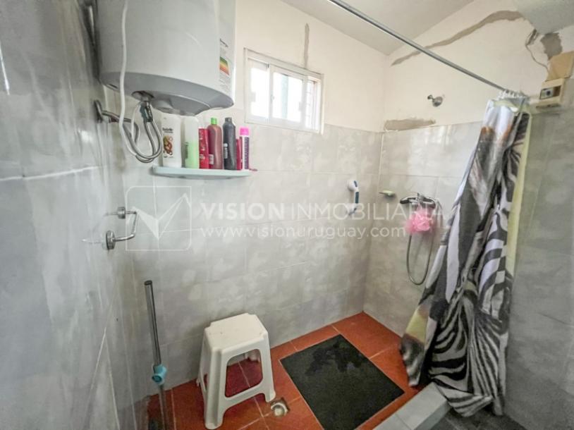 Venta conjunta de Dos Casas independientes en un gran terreno de 622 m2, una de 2 Dormitorios y 1 Baño, la otra de 1 Dormitorio y 1 Baño, Parrillero, Garaje. Barrio Español del balneario Atlántida, 8 cuadras al Norte de la Interbalnearia por Ruta 11.-38