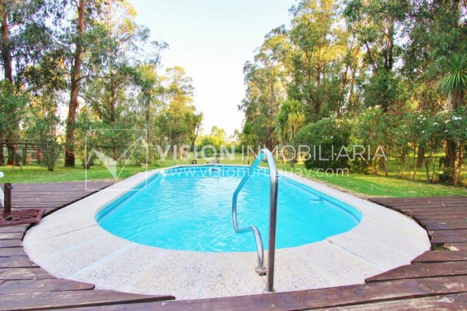Chacra de 15 hás con el confort de hermosa casa reciclada, barbacoa y piscina climatizada.-23