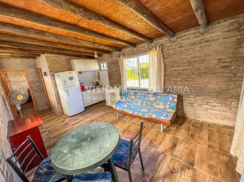 Venta conjunta de Dos Casas independientes en un gran terreno de 622 m2, una de 2 Dormitorios y 1 Baño, la otra de 1 Dormitorio y 1 Baño, Parrillero, Garaje. Barrio Español del balneario Atlántida, 8 cuadras al Norte de la Interbalnearia por Ruta 11.-47