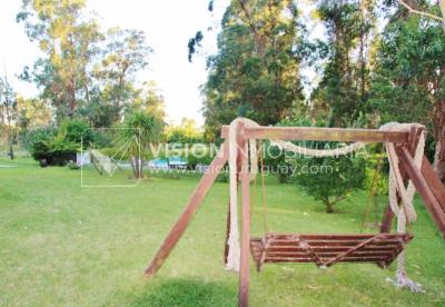Chacra de 15 hás con el confort de hermosa casa reciclada, barbacoa y piscina climatizada.