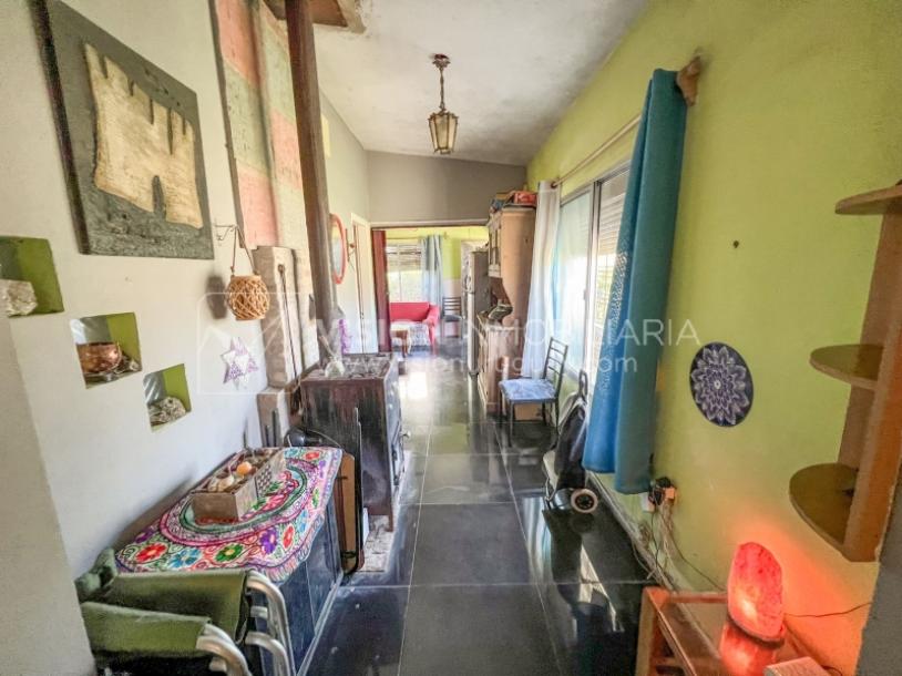 Venta conjunta de Dos Casas independientes en un gran terreno de 622 m2, una de 2 Dormitorios y 1 Baño, la otra de 1 Dormitorio y 1 Baño, Parrillero, Garaje. Barrio Español del balneario Atlántida, 8 cuadras al Norte de la Interbalnearia por Ruta 11.-28