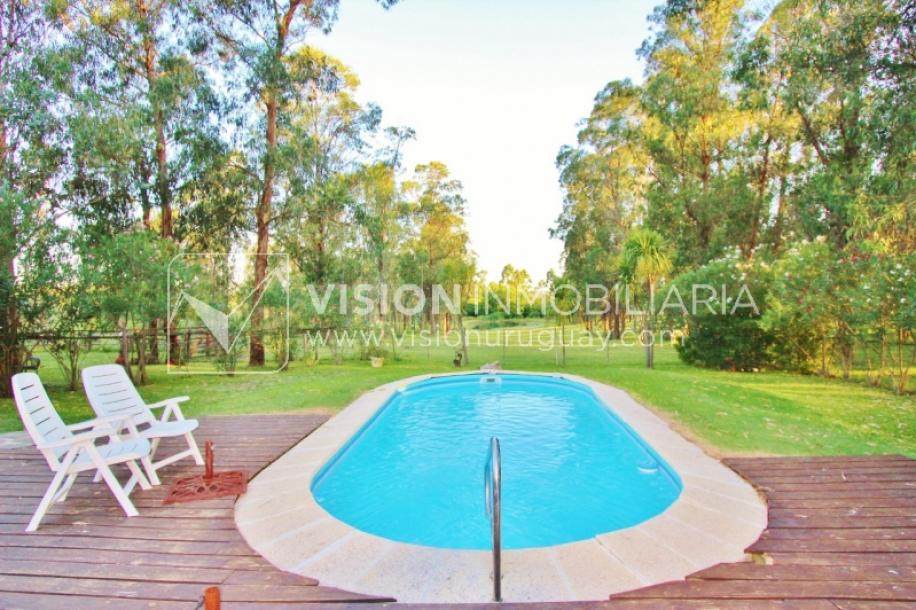 Chacra de 15 hás con el confort de hermosa casa reciclada, barbacoa y piscina climatizada.-24