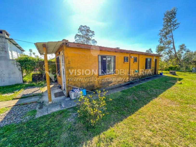 Venta conjunta de Dos Casas independientes en un gran terreno de 622 m2, una de 2 Dormitorios y 1 Baño, la otra de 1 Dormitorio y 1 Baño, Parrillero, Garaje. Barrio Español del balneario Atlántida, 8 cuadras al Norte de la Interbalnearia por Ruta 11.-45