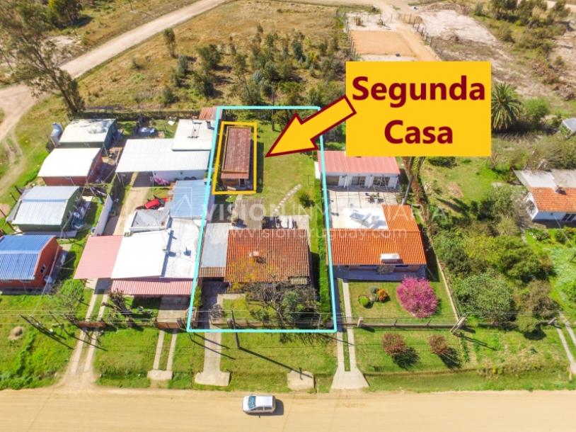 Venta conjunta de Dos Casas independientes en un gran terreno de 622 m2, una de 2 Dormitorios y 1 Baño, la otra de 1 Dormitorio y 1 Baño, Parrillero, Garaje. Barrio Español del balneario Atlántida, 8 cuadras al Norte de la Interbalnearia por Ruta 11.-2
